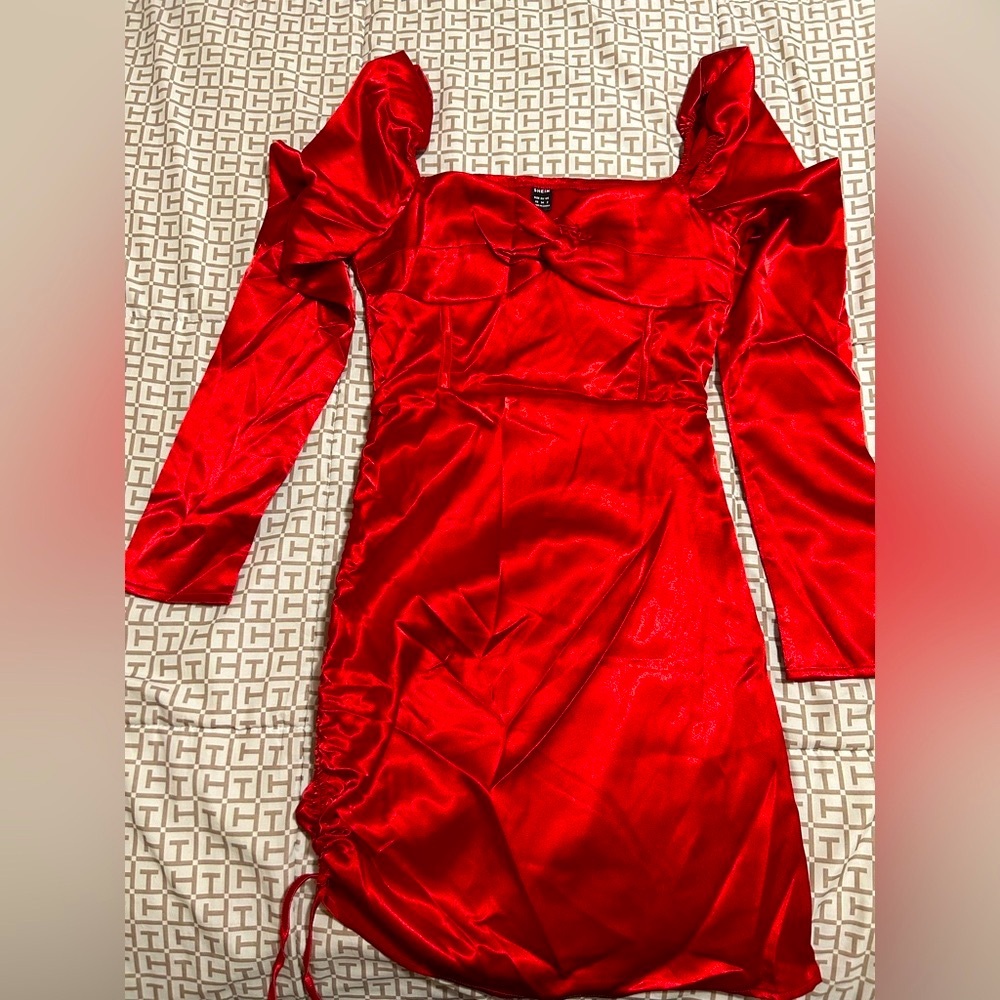 Sexy red dress, drawstring, cups, a symmetrical